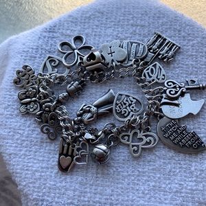 James Avery woman’s bracelet w/ lots of charms